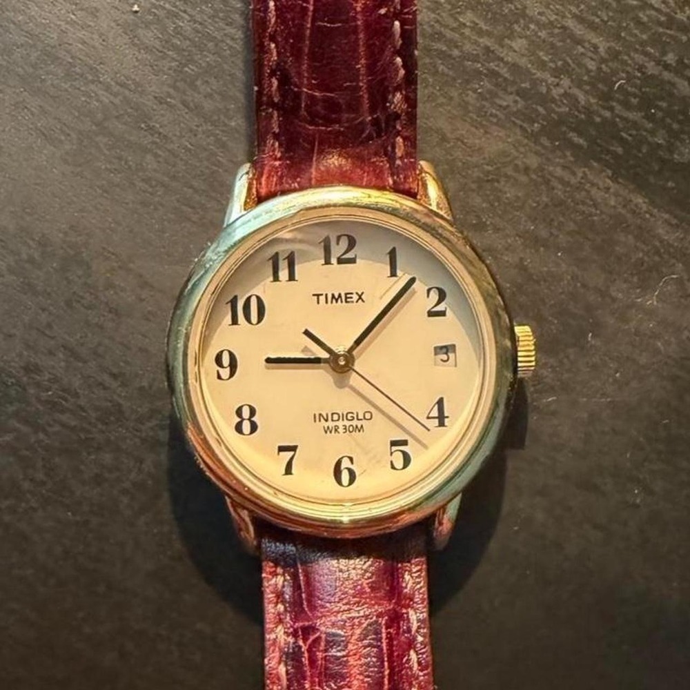 Timex Indiglo womans gold tone watch with leather brown band